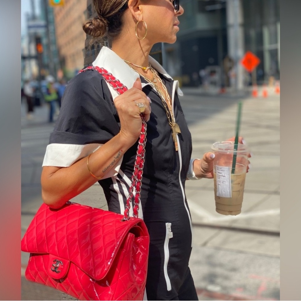Authentic Chanel jumbo double flap patent leather red/ coral bag.